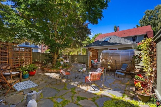 503 12th Ave E, Seattle, WA 98102 - fenced backyard with a patio