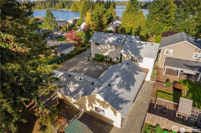 4715 N Island Dr E, Bonney Lake, WA 98391 - aerial view of residential area with a large body of water