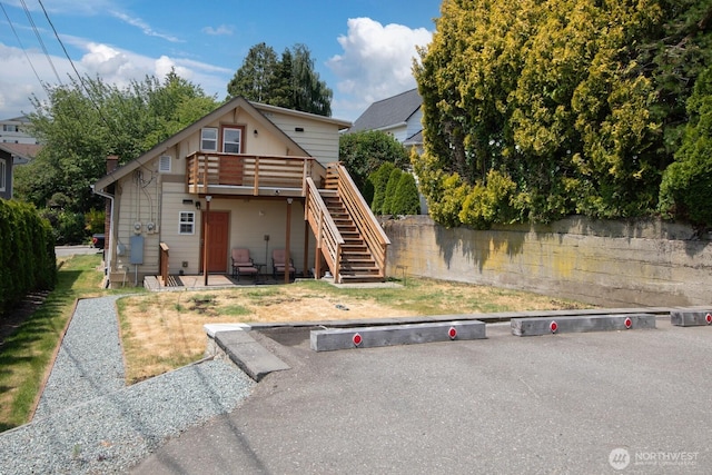3827 Wetmore Ave, Everett, WA 98201 - view of front of house featuring stairs and a deck
