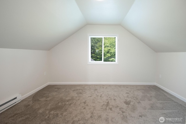 3827 Wetmore Ave, Everett, WA 98201 - additional living space featuring baseboard heating, carpet floors, and vaulted ceiling