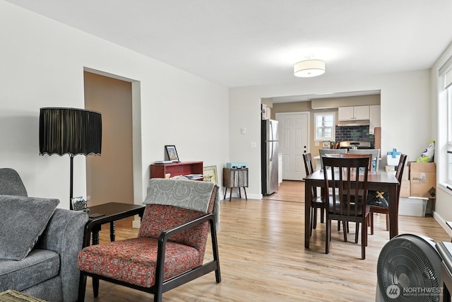 3827 Wetmore Ave, Everett, WA 98201 - dining space with light wood-type flooring and baseboards