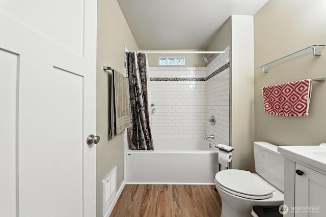 3827 Wetmore Ave, Everett, WA 98201 - full bath with shower / tub combo with curtain, wood finished floors, and vanity