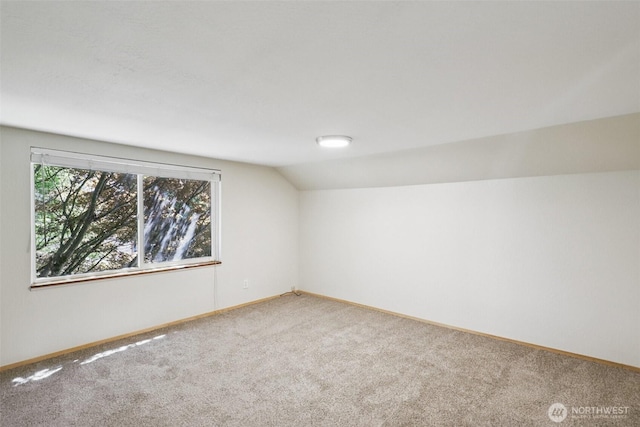 1425 N 1st Ave, Kelso, WA 98626 - carpeted spare room with lofted ceiling and baseboards