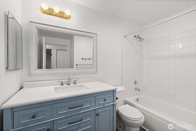 7453 Newcastle Golf Club Rd Unit L103, Newcastle, WA 98059 - bathroom featuring vanity and tub / shower combination