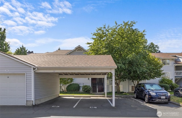 7453 Newcastle Golf Club Rd Unit L103, Newcastle, WA 98059 - view of partially covered parking lot