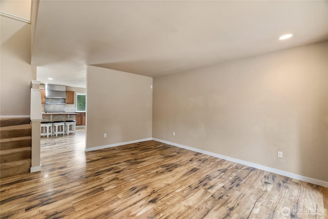 932 Tipsoo Loop N, Rainier, WA 98576 - spare room featuring light wood-style flooring, recessed lighting, and stairway