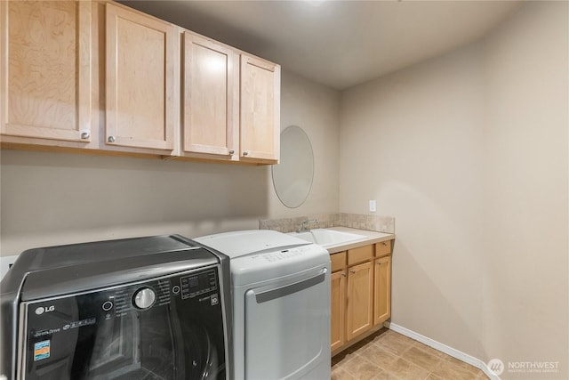 932 Tipsoo Loop N, Rainier, WA 98576 - washroom with washing machine and dryer and cabinet space
