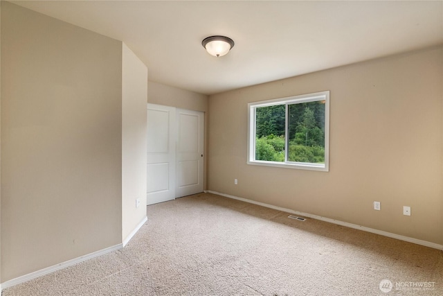 932 Tipsoo Loop N, Rainier, WA 98576 - unfurnished bedroom with carpet and baseboards