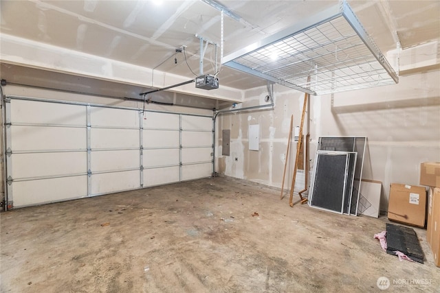 932 Tipsoo Loop N, Rainier, WA 98576 - garage featuring a garage door opener and electric panel