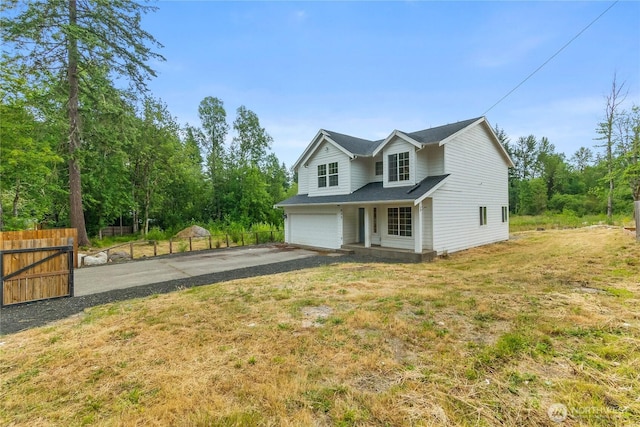932 Tipsoo Loop N, Rainier, WA 98576 - traditional-style home with driveway and a garage