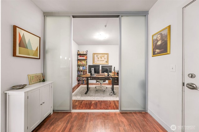 3104 Western Ave Unit 610, Seattle, WA 98121 - office area featuring dark wood-type flooring and baseboards