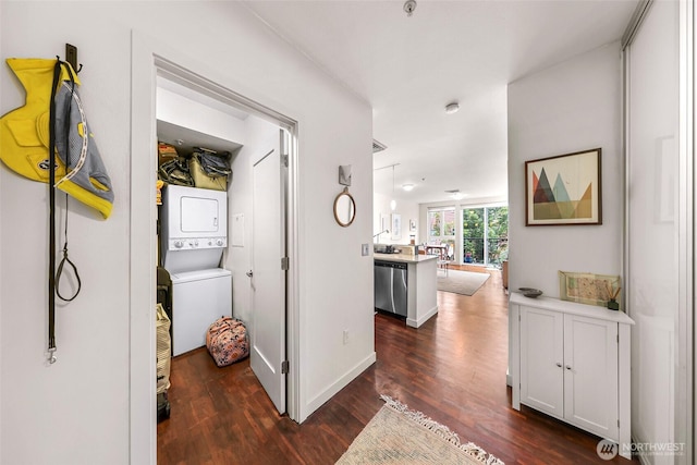 3104 Western Ave Unit 610, Seattle, WA 98121 - hall with estacked washer and dryer and dark wood-type flooring