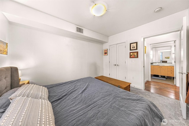 3104 Western Ave Unit 610, Seattle, WA 98121 - bedroom with carpet flooring and a closet