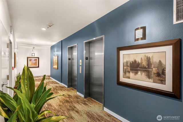 3104 Western Ave Unit 610, Seattle, WA 98121 - corridor with elevator and carpet floors