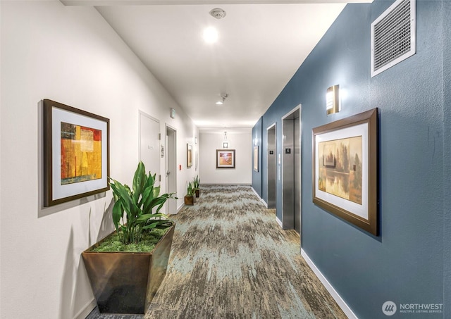 3104 Western Ave Unit 610, Seattle, WA 98121 - hall featuring wood finished floors and elevator