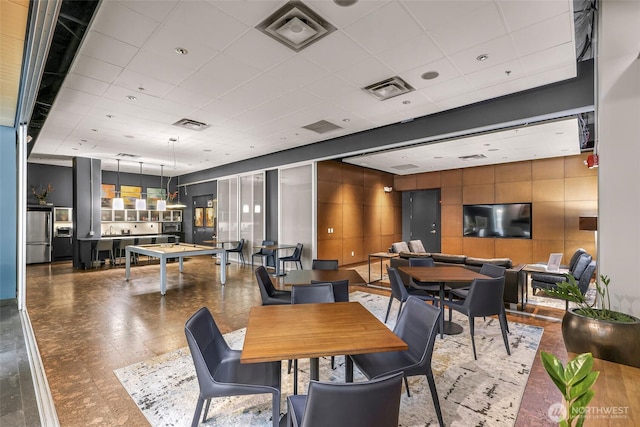 3104 Western Ave Unit 610, Seattle, WA 98121 - dining space featuring tile patterned floors and a drop ceiling