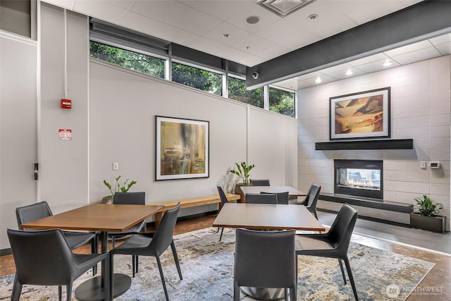 3104 Western Ave Unit 610, Seattle, WA 98121 - dining space with a glass covered fireplace