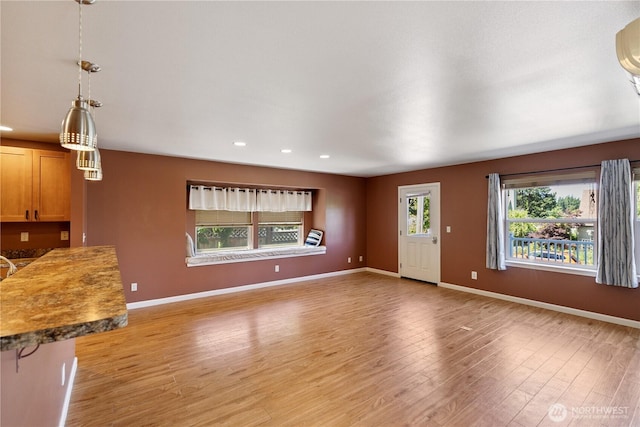1229 14th St, Port Townsend, WA 98368 - unfurnished living room featuring light wood-style flooring and recessed lighting
