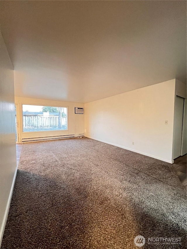 401 Biggs Dr, Moses Lake, WA 98837 - spare room featuring carpet flooring and a baseboard heating unit