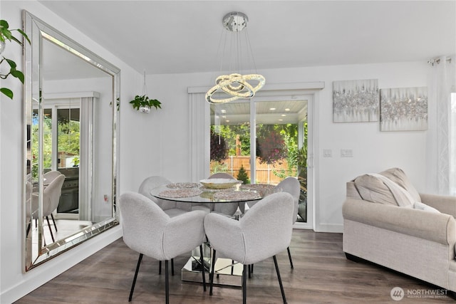 8254 Breeze Loop, Blaine, WA 98230 - dining room with dark wood finished floors and a chandelier