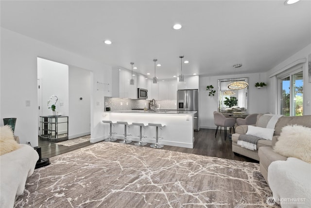 8254 Breeze Loop, Blaine, WA 98230 - living room featuring wood finished floors and recessed lighting