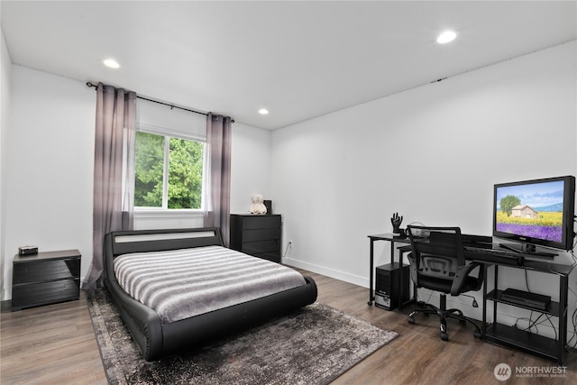 8254 Breeze Loop, Blaine, WA 98230 - bedroom featuring wood finished floors, recessed lighting, and an office area
