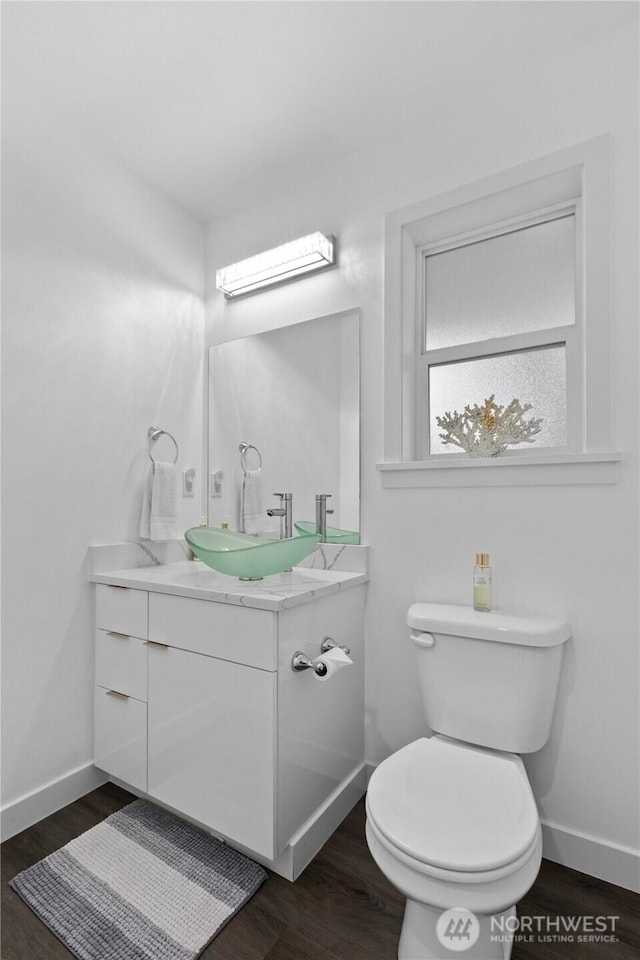 8254 Breeze Loop, Blaine, WA 98230 - half bath featuring vanity and wood finished floors