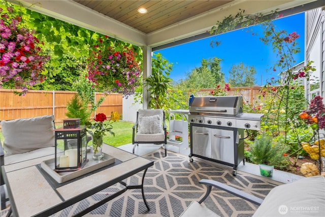8254 Breeze Loop, Blaine, WA 98230 - fenced backyard with a patio and a grill