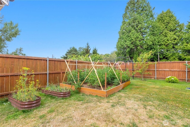 8254 Breeze Loop, Blaine, WA 98230 - fenced backyard featuring a garden