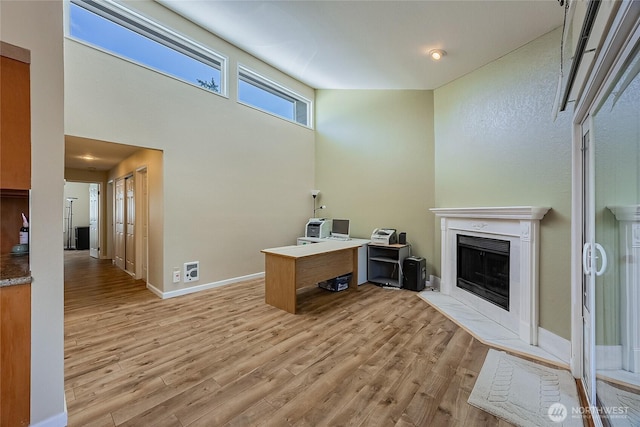 4164 Factoria Blvd SE Unit B11, Bellevue, WA 98006 - office area featuring a fireplace with flush hearth and wood finished floors