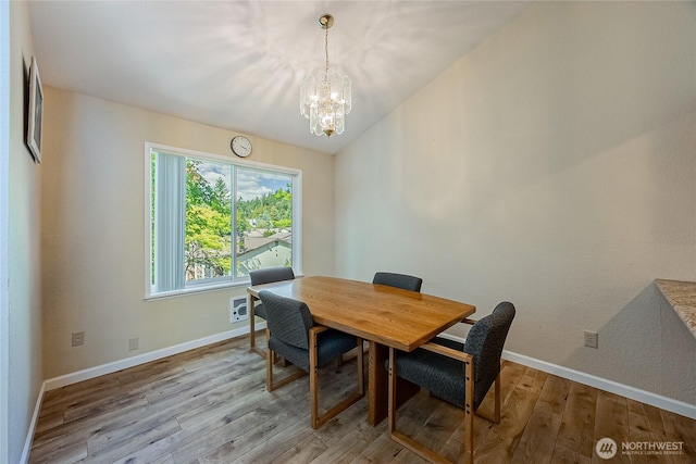 4164 Factoria Blvd SE Unit B11, Bellevue, WA 98006 - dining room with a chandelier and wood finished floors
