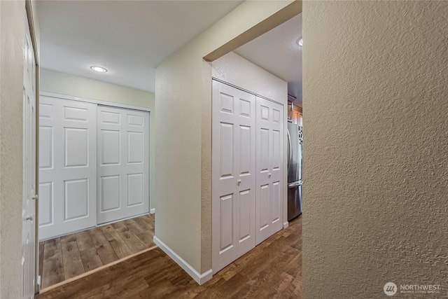 4164 Factoria Blvd SE Unit B11, Bellevue, WA 98006 - hall featuring dark wood-style flooring and a textured wall