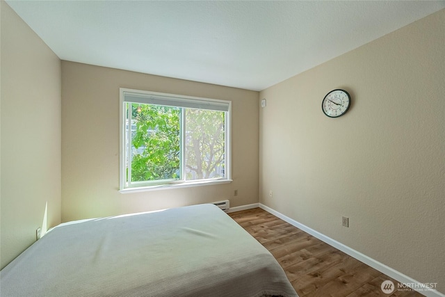 4164 Factoria Blvd SE Unit B11, Bellevue, WA 98006 - bedroom featuring wood finished floors and baseboards