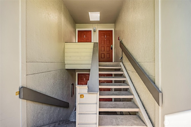 4164 Factoria Blvd SE Unit B11, Bellevue, WA 98006 - stairway featuring a textured wall