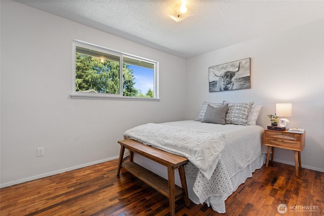 3317 N Baltimore St, Tacoma, WA 98407 - bedroom with wood finished floors and a textured ceiling