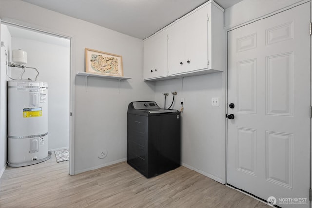 3317 N Baltimore St, Tacoma, WA 98407 - washroom with washer / dryer, secured water heater, cabinet space, and light wood-style floors