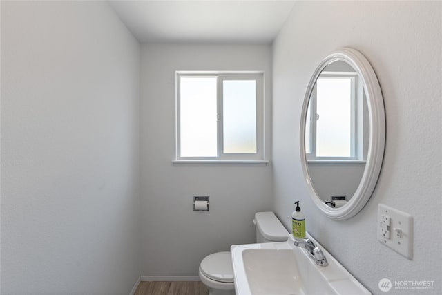3317 N Baltimore St, Tacoma, WA 98407 - bathroom featuring a sink and wood finished floors