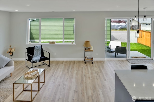 6410 S Fife St, Tacoma, WA 98409 - living area featuring plenty of natural light, wood finished floors, and recessed lighting