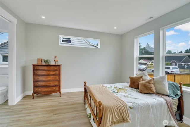 6410 S Fife St, Tacoma, WA 98409 - bedroom with light wood-style flooring and recessed lighting