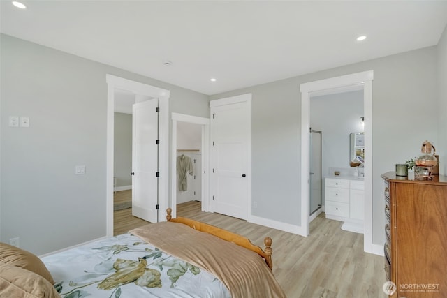 6410 S Fife St, Tacoma, WA 98409 - bedroom featuring light wood-style floors, recessed lighting, and ensuite bath