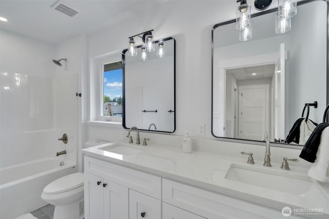 6410 S Fife St, Tacoma, WA 98409 - bathroom with double vanity and bathtub / shower combination