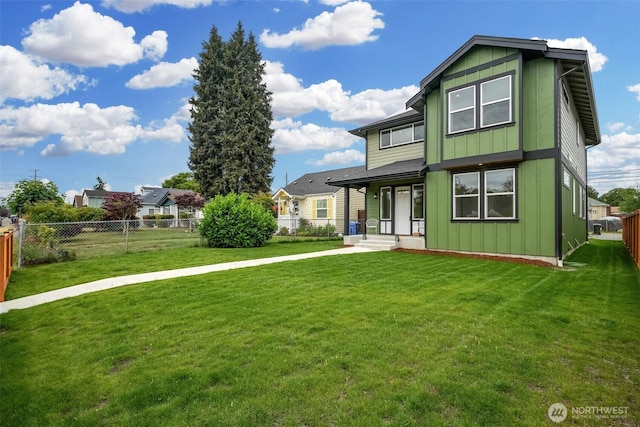 6410 S Fife St, Tacoma, WA 98409 - back of property with board and batten siding and a fenced backyard