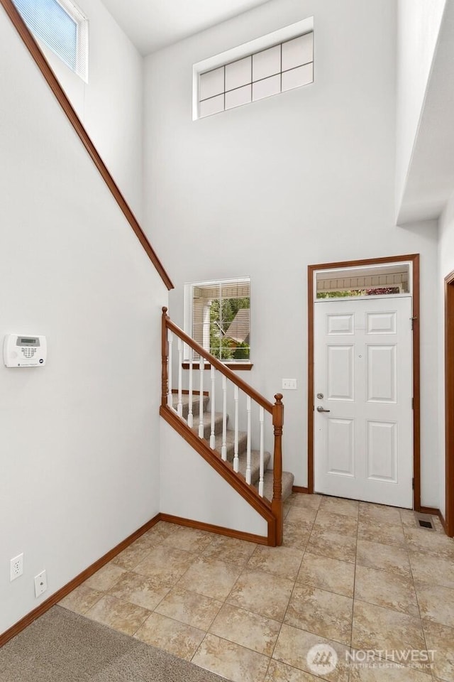 18214 97th Avenue Ct E, Puyallup, WA 98375 - entrance foyer featuring stairway, plenty of natural light, and a high ceiling