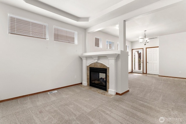 18214 97th Avenue Ct E, Puyallup, WA 98375 - unfurnished living room with carpet floors, a chandelier, and a fireplace