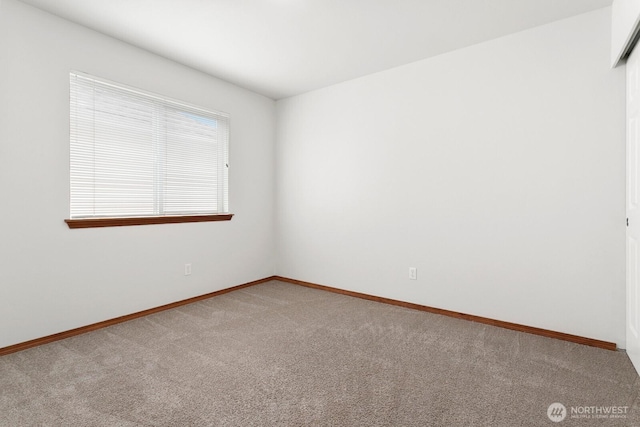 18214 97th Avenue Ct E, Puyallup, WA 98375 - empty room featuring carpet floors and baseboards