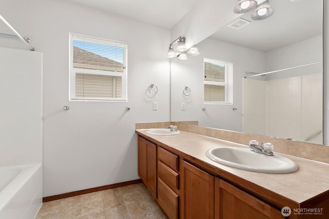 18214 97th Avenue Ct E, Puyallup, WA 98375 - bathroom featuring double vanity and bathing tub / shower combination
