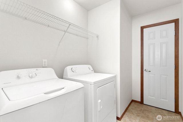 18214 97th Avenue Ct E, Puyallup, WA 98375 - washroom featuring washer and dryer and baseboards