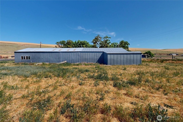 238 Patit Rd, Dayton, WA 99328 - view of yard featuring an outbuilding, an outdoor structure, and a rural view