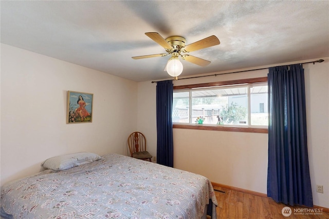 238 Patit Rd, Dayton, WA 99328 - bedroom with wood finished floors and ceiling fan