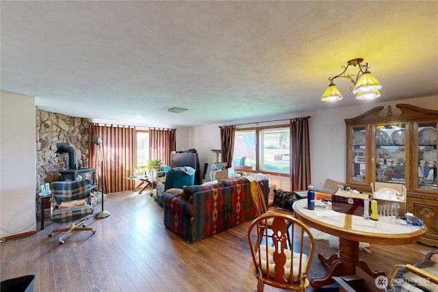 238 Patit Rd, Dayton, WA 99328 - living room featuring a wood stove and wood finished floors